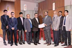 Ishtiaque Ahmed Chowdhury, MD & CEO of the Bank handing over the Statutory donation cheque for the