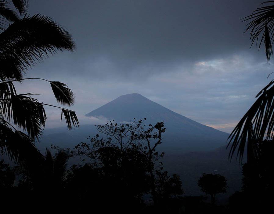 The smoking Mount Agung volcano in tourist hotspot Bali has been hit by 300 huge