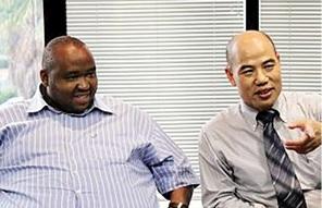 Khulubuse Zuma with Jen-Chih Robert Huang at Mpisi, Huang's company, circa 2009.