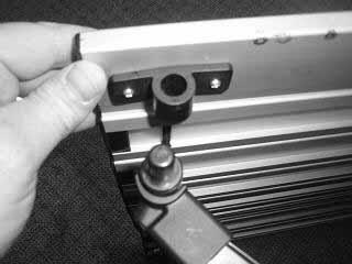 frame as shown. Be sure the screw heads on the support bars face outward. (Figure 6a) Figure 6a 11.