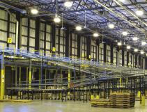 of 9.2 acres or 8.3 football fields in size). The storage space in this facility accommodates eight-high racks that yield 27,300 pallet spaces, storing all in-bound components and finished goods.