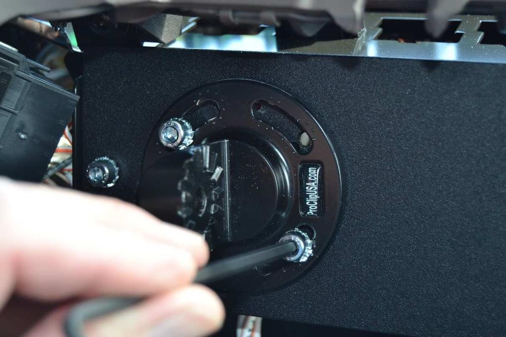 3. Use the included machine screws to securely attach the ProClip plate onto the dash frame. 4.