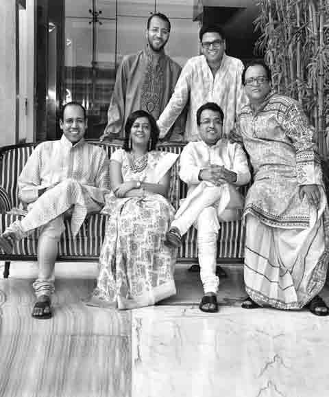 Passing on the legacy The next generation: (Seated left to right) Shri Mohan Goenka, Smt. Priti Sureka, Shri Harsha V.