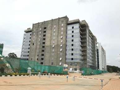 Realty Bengaluru Blck -2 The facade wrk is underway alng with lw side HVAC wrk, electrical wrks and