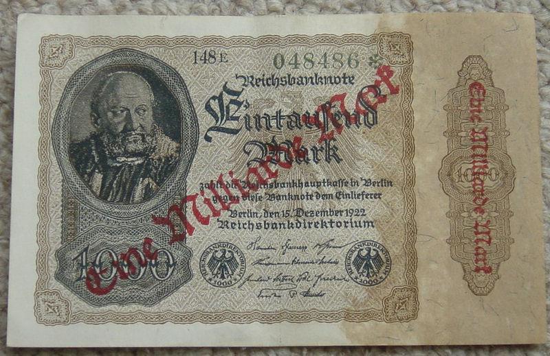 Hyperinflation Example: Inflation in the Weimar Republic 1000 Mark banknote, over-stamped in red with a