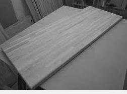 (c) A kitchen worktop measures 301 cm, correct to the nearest 1 cm. Derek needs to fit two of these worktops together along a wall measuring 605 cm, correct to the nearest 5 cm.