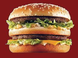 If a Big Mac costs 1.71 in UK and only 3 $ in US, the PPP ratio is 1.71/3=0.57. Suppose that the e is 0.5, it means that we need to 1.