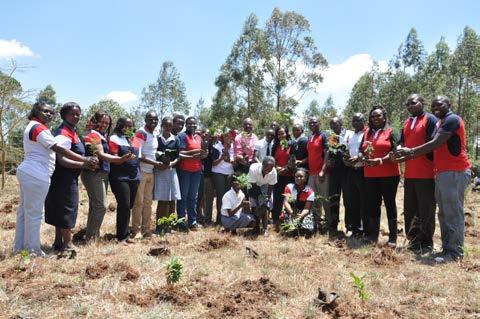 Tree planting at Kibiko Secondary School Kenya Reinsurance Corporation Ltd, General Manager, Property & Administration, Mr.