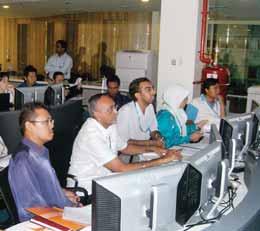 BUILDING OUR PEOPLE ANNUAL REPORT 2009 01 02 01 Water Quality Programme Training 02 SCADA Command Centre Training: Video Wall The Group spent approximately RM550,000 on training in 2009, as follows: