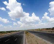in the State of Andhra Pradesh SCOPE Development of two-lane highway with paved shoulder with an aggregate length of approximately 248 lane kms with an option to upgrade to a four-lane highway on the