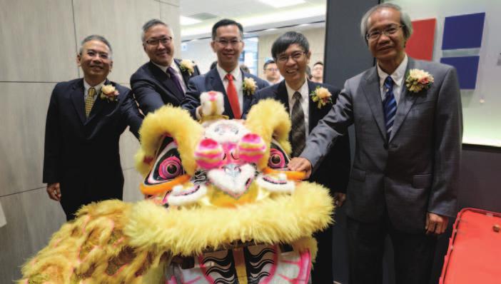 Tam Kwok Wah (Non-executive Director) attending the grand opening of the new head office of the Group resources efficiently.