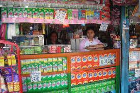 Sari-sari store owner or market vendor goes to Bank to