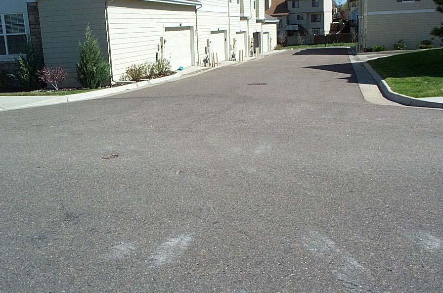 Comp #: 402 Asphalt - Seal Coat/crack fill Some loss of seal and overall dryness noted throughout.