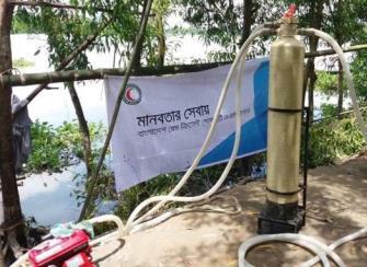 Standing beside the flood affected Water Purification Medical