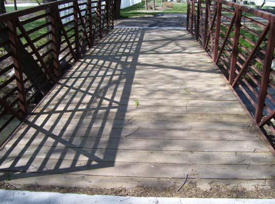 Comp #: 1390 Footbridge - Refurbish Location: Quantity: Waking path (1) 35 X 10 ft.