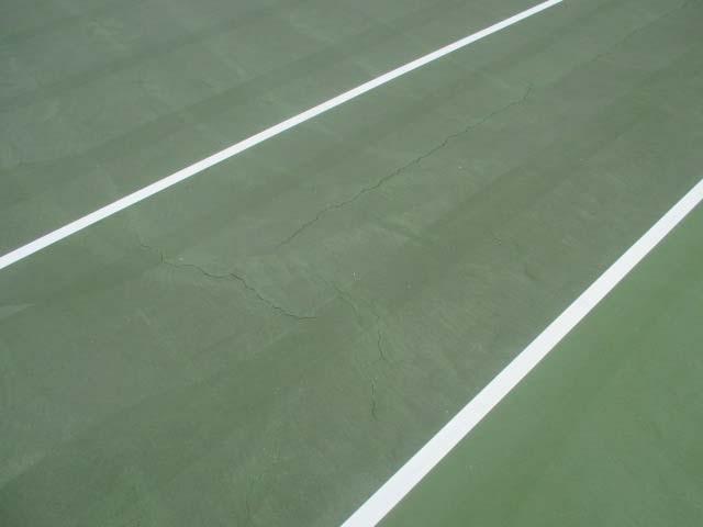 Client: 29086D Calusa Point - Amenities Comp #: 2811 Tennis Courts - Resurface Quantity: (2) Courts Location: Tennis courts Evaluation: Some cracks showing through the surface, but not extreme.