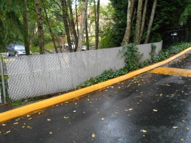 Comp #: 155 Chain Link Fence - Replace Quantity: ~ 1,000 linear feet Funded?: Yes. History: 2004 Location: South perimeter of property Evaluation: Fair condition without noteworthy instability.