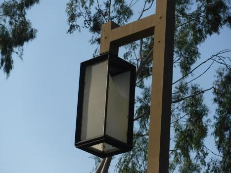 Comp #: 320 Pole Lights - Replace Quantity: (24) Fixtures Location: Adjacent to streets and walks Evaluation: Inspected during daylight hours, but assumed to be functional.