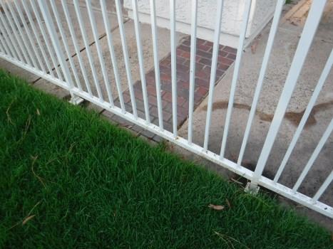 Comp #: 503 Metal Fence/Rail - Partial Replace Quantity: Approx. 1/3 of 290 LF Location: Pool perimeter Evaluation: All stair railings were replaced with vinyl, now only pool fencing remains metal.