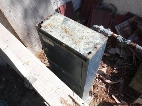 Throughout community Evaluation: All four remaining steel enclosures are heavily aged, rusted exhibit metal wear-through, etc. Should be replaced as soon as possible.