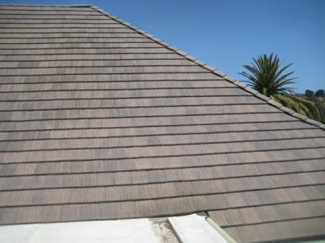 Comp #: 1306 Clubhouse Tile Roof - 30-yr Repair Quantity: Approx. 17250 GSF Location: Clubhouse roof History: Reportedly approx 2000 Comments: Good condition. No slipping movement or loss.