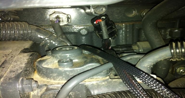 (Sensor is located toward the back side of the engine) 3) Unplug the stock connector to the Fuel Pressure Sensor.