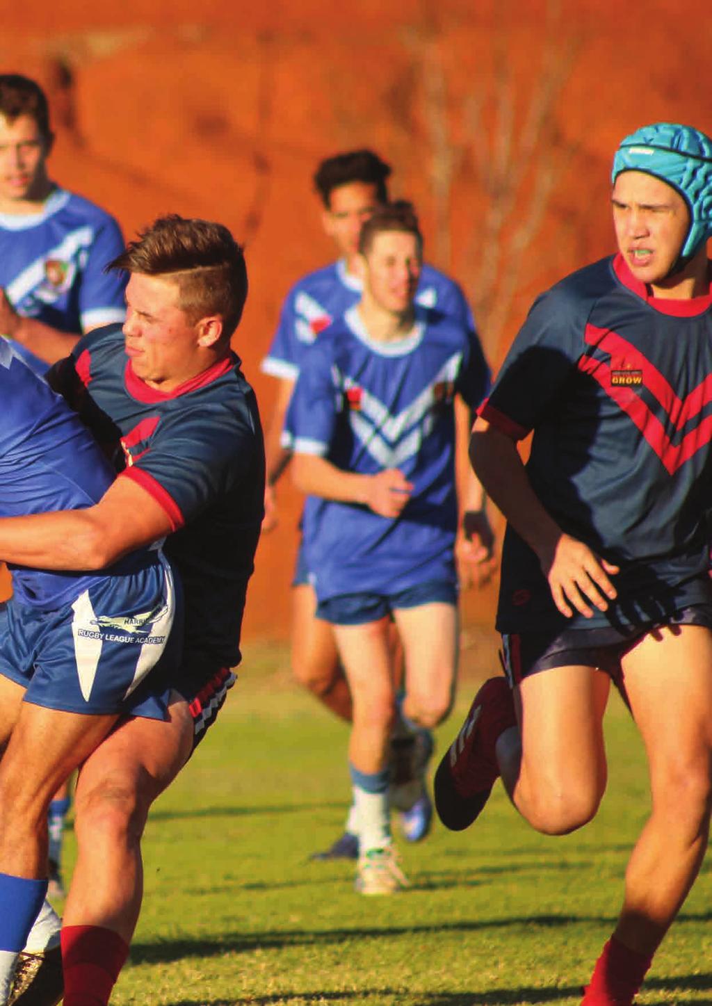 Warwick and Harristown Academies compete for the ball during a rugby