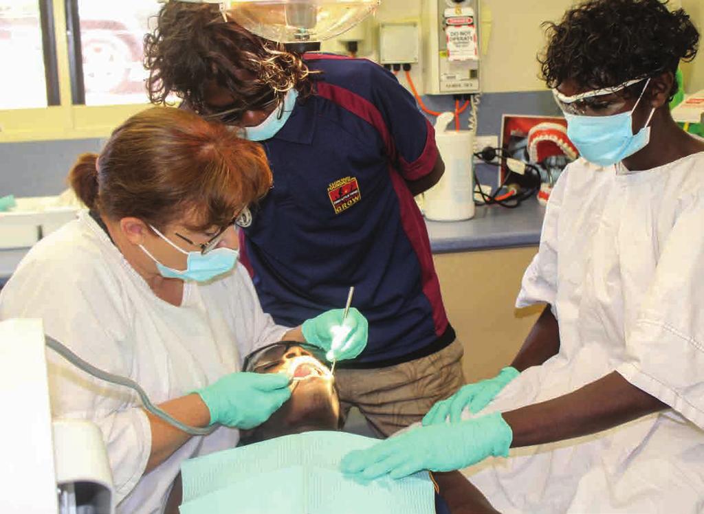 Yirrkala Academy (NT) boys learn about the importance of dental hygiene during a check up with Miwatj Health.