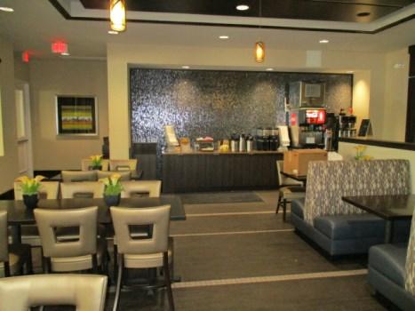 Comp #: 2746 Cafe - Remodel Quantity: (1) Kitchen Location: Clubhouse interior Evaluation: Includes approximately 1,170 GSF of tile flooring, (6) large tables, (3) booth seats, (14) small tables,