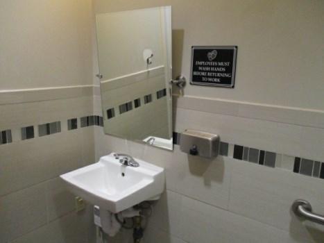 Comp #: 2749 Bathroom (Unisex) - Remodel Quantity: (1) Bathroom Location: Adjacent to locker rooms Evaluation: Includes approximately 85 GSF of floor tiling, approximately 185 GSF of wall tiling, (1)