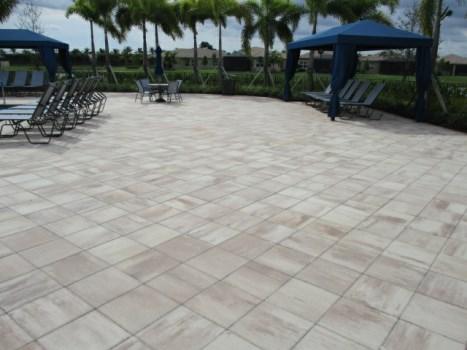 Comp #: 2769 Pool Deck (Pavers) - Resurface Quantity: Approx 26,400 GSF Location: Pool deck Evaluation: 16" concrete pavers in good condition.