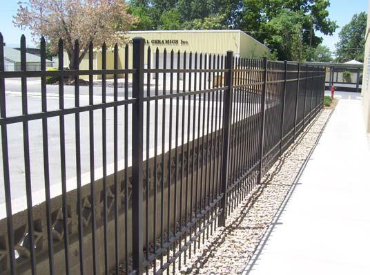 Comp #: 207 Wrought Iron Fencing - Repaint Perimeter fence Approx 510 Linear ft.