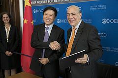 Also China joins international efforts to end tax evasion Mr. Angel Gurria, OECD Secretary General and Mr.