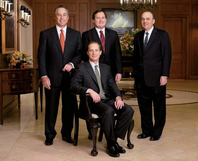In addition to William Osborn, Management Committee members are (standing from left) William L. Morrison, Timothy J. Theriault and Perry R. Pero and (seated) Terence J. Toth.