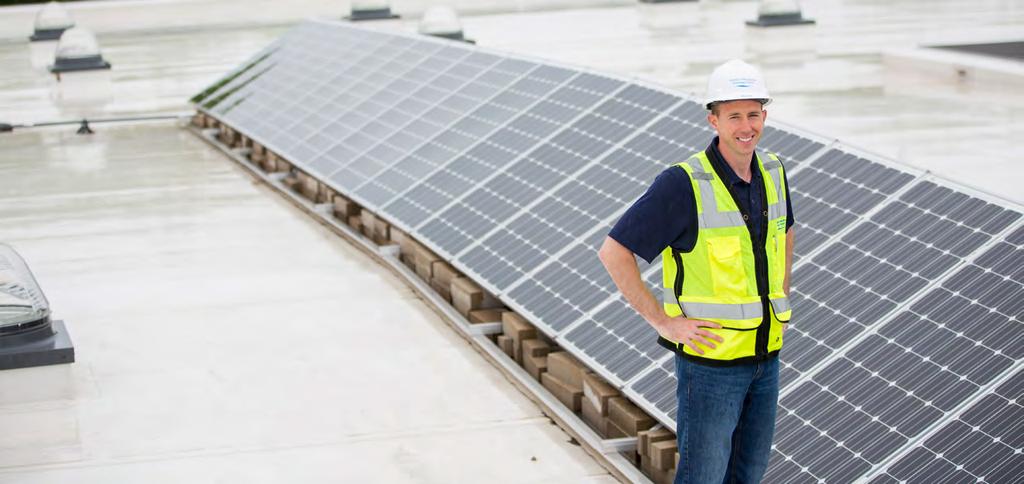 APPENDIX E 2019 SALARIED WAGE SCHEDULE Eric Dundee, director of wastewater operations and reliability, checks a solar panel installation.