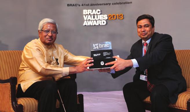 RAC Chairman Sir Fazle Hasan Abed handing over BRAC Value Award for the year 2013 to Md.