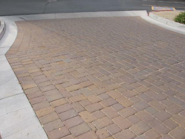 Comp #: 204 Concrete Pavers - Repair Quantity: Approx 27,700 Sq Ft Location: Community entrances/exits and various sections of the driveway Evaluation: There is no expectancy for complete replacement