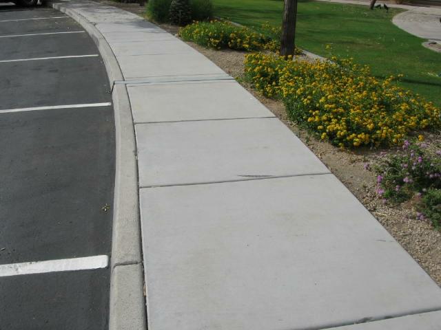 Comp #: 210 Concrete - Repair Quantity: Numerous Sq Ft Location: Walkways, curbs, and gutters Evaluation: There is no expectancy to completely replace the concrete.