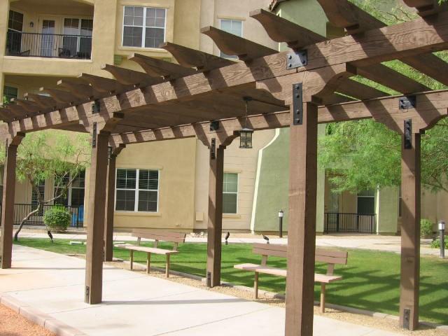 Comp #: 425 Wood Pergolas - Replace Quantity: Approx 1,840 Sq Ft Location: (3) structures throughout common area and (1) structure in the pool area Evaluation: Wood pergola structures are in good