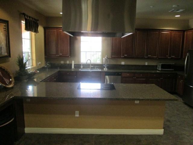 Comp #: 920 Kitchen - Remodel Quantity: (1) Kitchen Location: 1st floor in the Multi-Purpose Room, includes lobby tile floor Evaluation: This component funds to eventually replace the kitchen