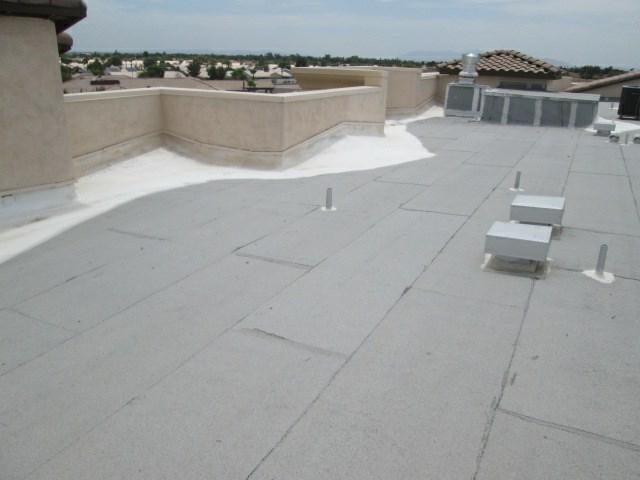 Comp #: 1040 Flat Roofs - Replace Quantity: Approx 91,400 Sq Ft Location: Rooftop of Buildings 10, 11 & 12 Evaluation: Some roof repairs have been made.