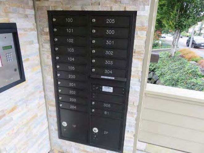 Controlled Access Panel Mailbox Bank There is a mailbox bank at the east entrance to this building that we understand was installed in 2016.