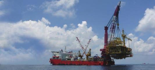 Hydrocarbon IC L&T s heavy-lift-cum-pipelay vessel LTS 3000 installing a topside for Newfield Peninsula in Malaysia.