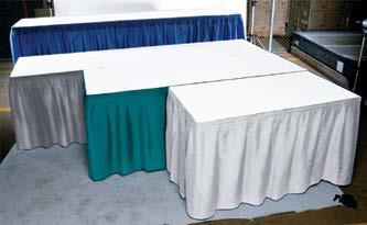 Display Tables, Carpet & Drapery Draped Display Tables Draped tables include white vinyl top and pleated skirt on three sides. Fourth side draping can be added. See order form for details.