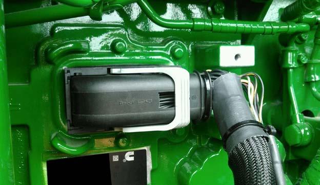 3) Connect the male plug from the new module harness into the stock ECM. Rotate the Cam Lock as shown to lock the connector in place.