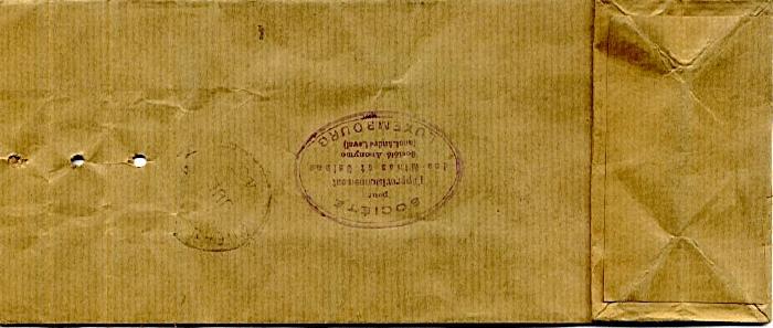 It was a little paper bag with a red label reading Echantillons sans Valeur (in English, samples without value), 35c, 50c and 1 franc definitives, and small holes on the right side where the bag once