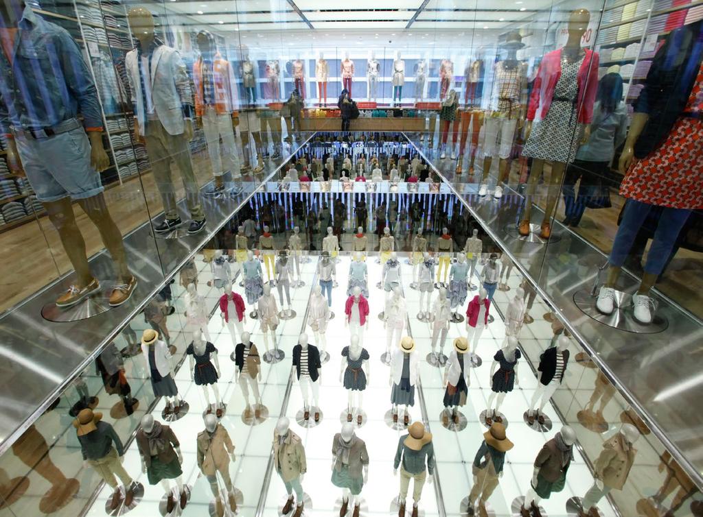 Mannequins are displayed at Fast Retailing s flagship Uniqlo store in Tokyo s Ginza district, March 16, 2012.