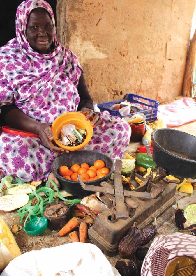 MauritaniA Nejiha, a CASH+ beneficiary, at her market