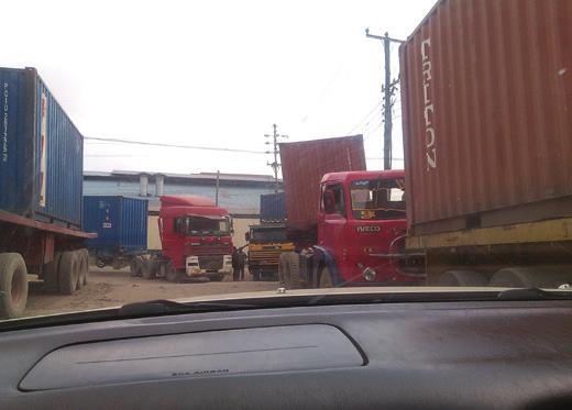 AN ICD CAUSES SEVERE CONGESTION TO CHANG OMBE INDUSTRIES *Industry owners cry foul as they lose businesses A congestion along Saza and Mbozi roads. two roads has been hampered.