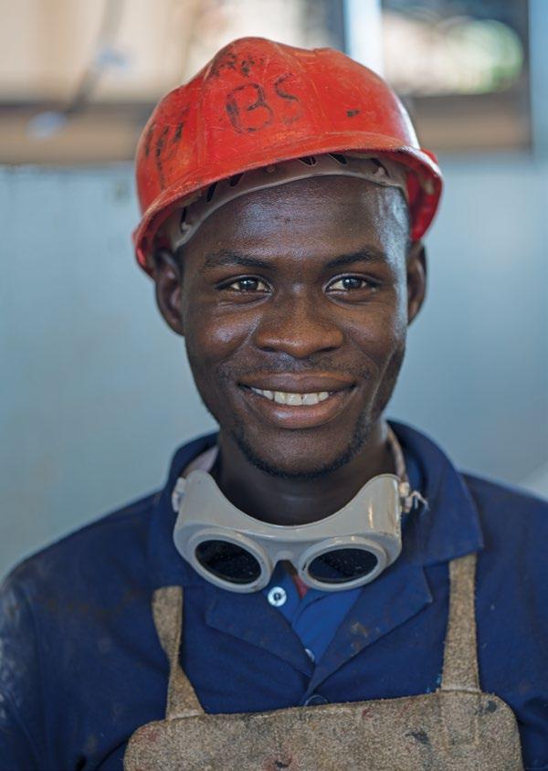 A welder in a bus assembly plant in Senegal.